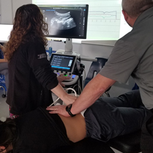 picture Vancouver chiropractic ultrasound imaging of spinal vertebrae during treatment